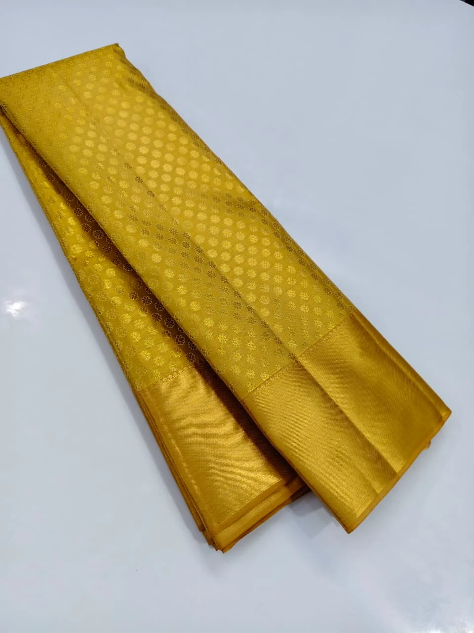 Muttu Kattam Gold Pure Kanchipuram Silk Saree.